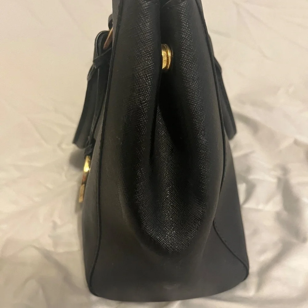 Michael Kors Medium Black Leather Bag. Barely used. Wear on shoulder / handles.
